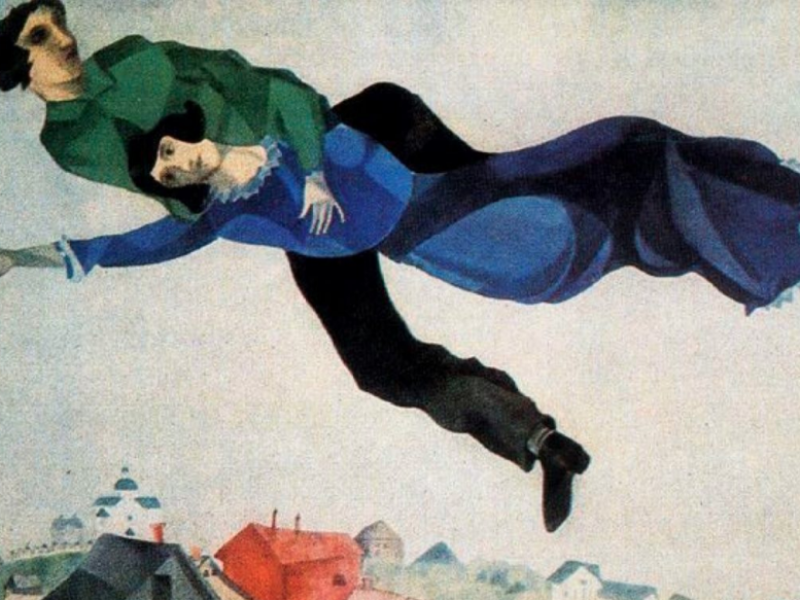Surrealist painting, Lovers in the Sky by Marc Chagall. 2 people entwined in a hug with melancholic facial expressions flying over a town